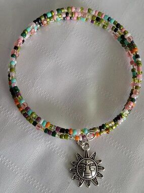 Handmade memory wire bracelet with beads and pendant
